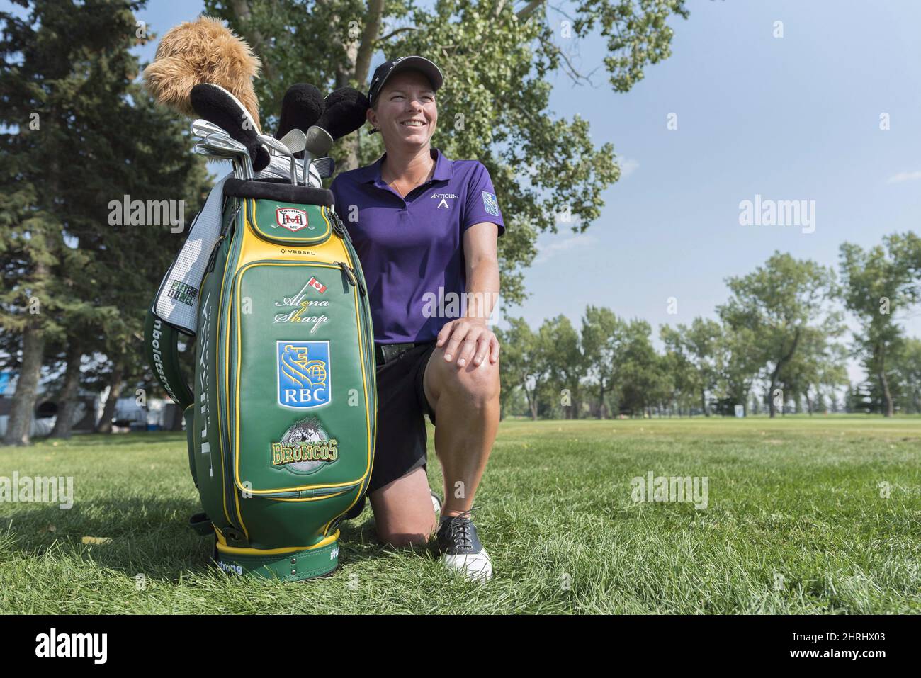 Alena Sharp poses with her golf bag during the CP Women's Open at Wascana Country Club in Regina on August 21, 2018. Most golfers look for balance in their swing. Hamilton's Alena Sharp found it in her life and is now reaping the benefits on the LPGA Tour. Sharp was named Golf Canada's player of the week on Feb. 18 after tying for sixth at the Women's Australian Open and tying for 17th at the Victoria Open to open the LPGA Tour's season. Sharp credits a more measured approach to training and a better work-life balance to help her stay focused after a frustrating 2018 where she battled with dep Stock Photo