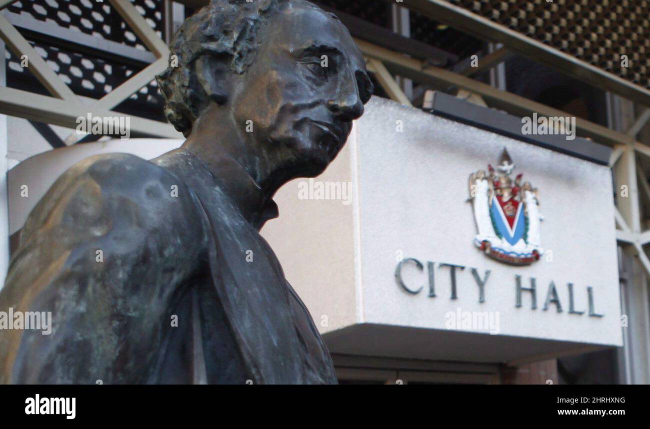 A statue of Sir John A. Macdonald is seen outside of City Hall in