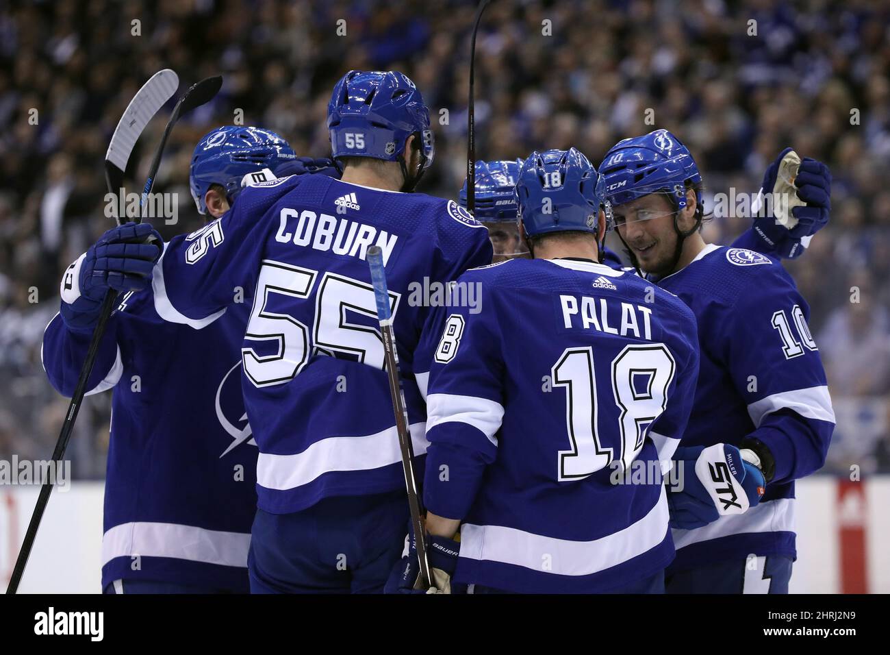 Tampa Bay Lightning defenseman Braydon Coburn (55), left wing Ondrej Palat  (18), and center J.T. Miller (10) celebrate a second-period goal against  the Toronto Maple Leafs in NHL hockey game actio …