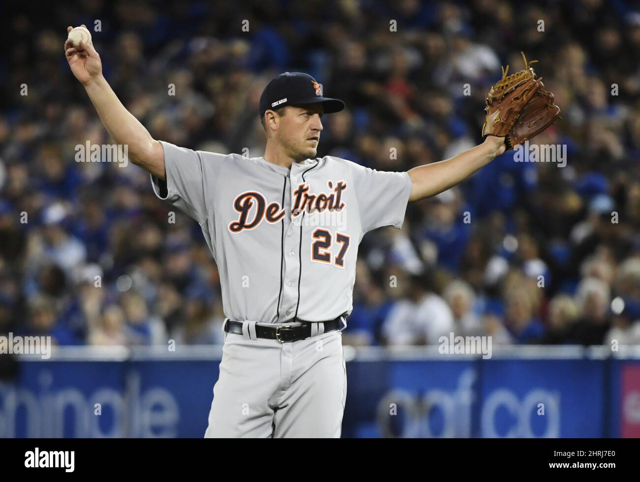 Detroit Tigers starting pitcher Jordan Zimmermann (27) reacts after giving up a hit to Toronto Blue Jays left fielder Teoscar Hernandez, not shown, during seventh inning AL baseball action in Toronto on Thursday, March 28, 2019. THE CANADIAN PRESS/Nathan Denette Stock Photo