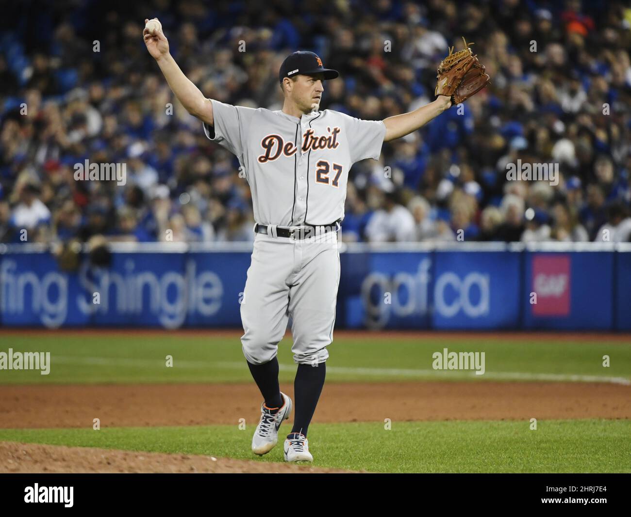 Detroit Tigers starting pitcher Jordan Zimmermann (27) reacts after giving up a hit to Toronto Blue Jays left fielder Teoscar Hernandez, not shown, during seventh inning AL baseball action in Toronto on Thursday, March 28, 2019. THE CANADIAN PRESS/Nathan Denette Stock Photo