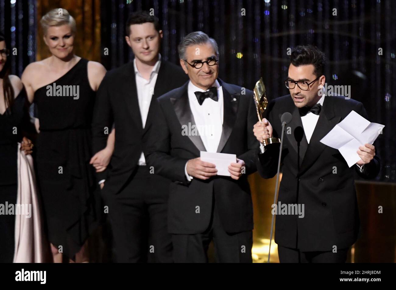 Daniel Levy speaks as cast members of "Schitt's Creek" accept their
