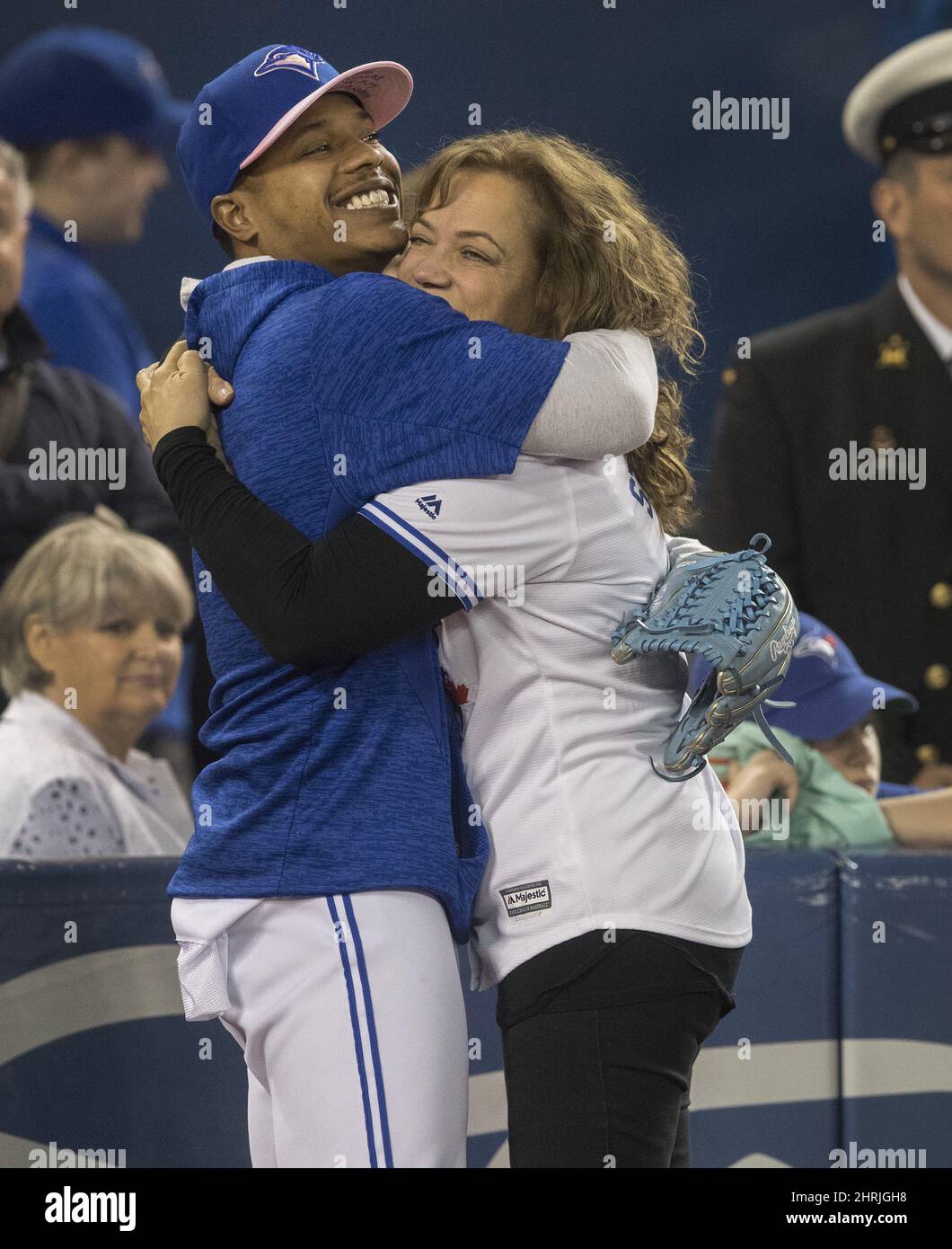 Adlin Auffant, mother of Toronto Blue Jays pitcher Marcus Stroman, throws  out the ceremonial first pitch prior to a baseball game against the Chicago  White Sox in Toronto, Sunday, May 12, 2019. (