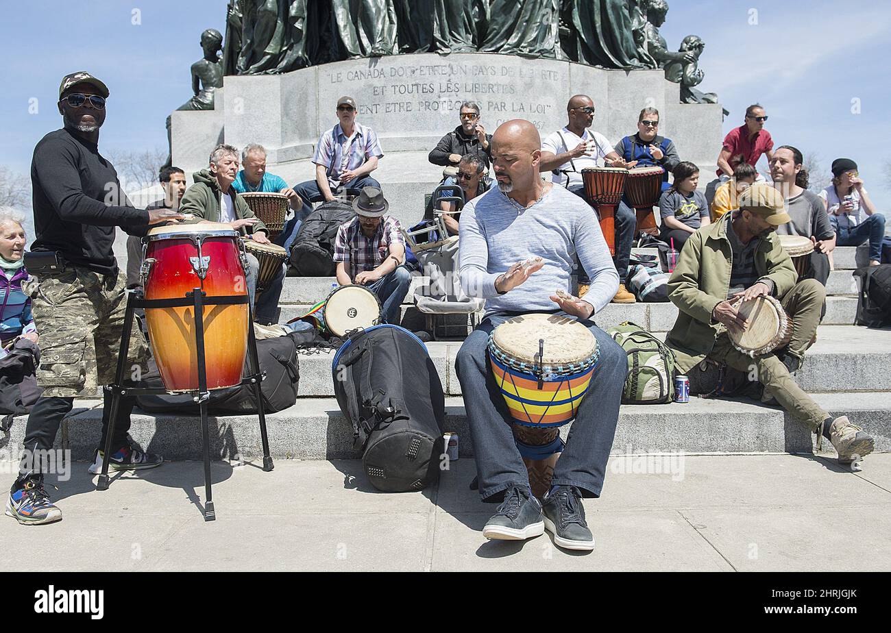 People play drums during the TamTams festival in Montreal, Sunday, May