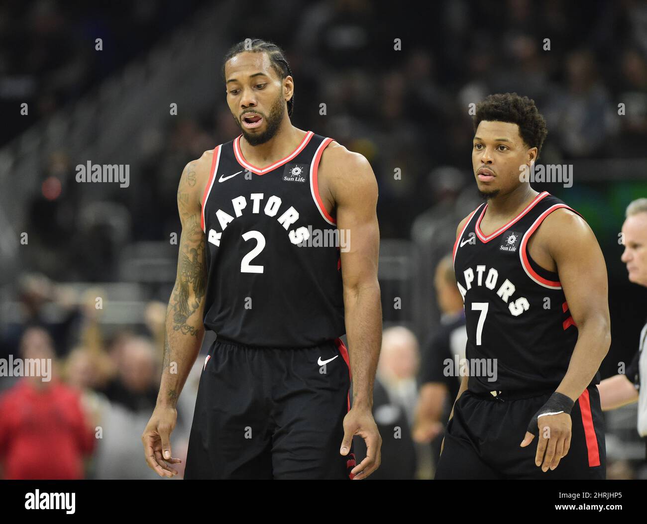 Toronto Raptors forward Kawhi Leonard (2) and Toronto Raptors guard Kyle Lowry (7) react during a break in play first half Game 2 of the NBA basketball Eastern Conference finals against the Milwaukee Bucks in Milwaukee on Friday, May 17, 2019. THE CANADIAN PRESS/Frank Gunn Stock Photo