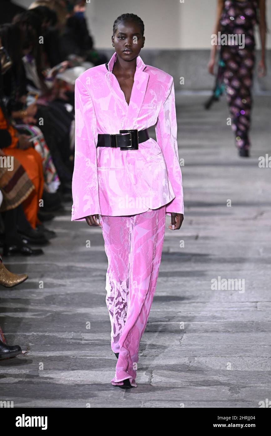 Milan, It. 25th Feb, 2022. Model Adut Akech walks on the runway at the Etro  fashion show during Fall Winter 2022 Collections Fashion Show at Milan  Fashion Week in Milan, Italy on