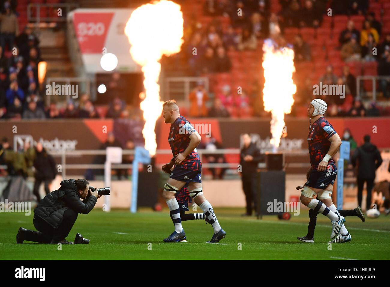 Bristol, UK. 25th Feb, 2022. Bristol Bears players enter the pitch with a fire display during the Gallagher Premiership Rugby match between Bristol Rugby and Wasps at Ashton Gate, Bristol, England on 25 February 2022. Photo by Scott Boulton. Editorial use only, license required for commercial use. No use in betting, games or a single club/league/player publications. Credit: UK Sports Pics Ltd/Alamy Live News Credit: UK Sports Pics Ltd/Alamy Live News Stock Photo