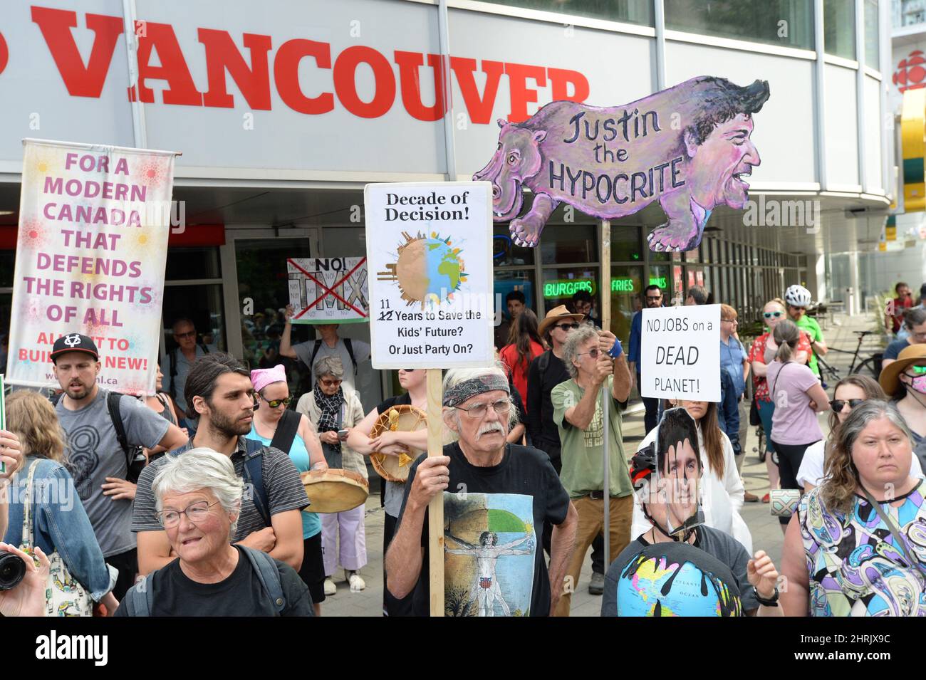 Protesters take part in a pipeline expansion demonstration in downtown