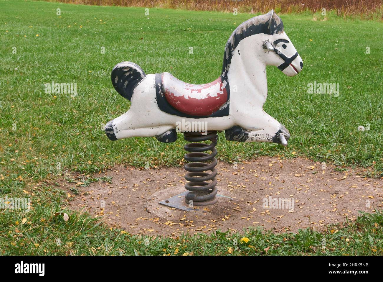 rocking horse with spring at the park Stock Photo Alamy