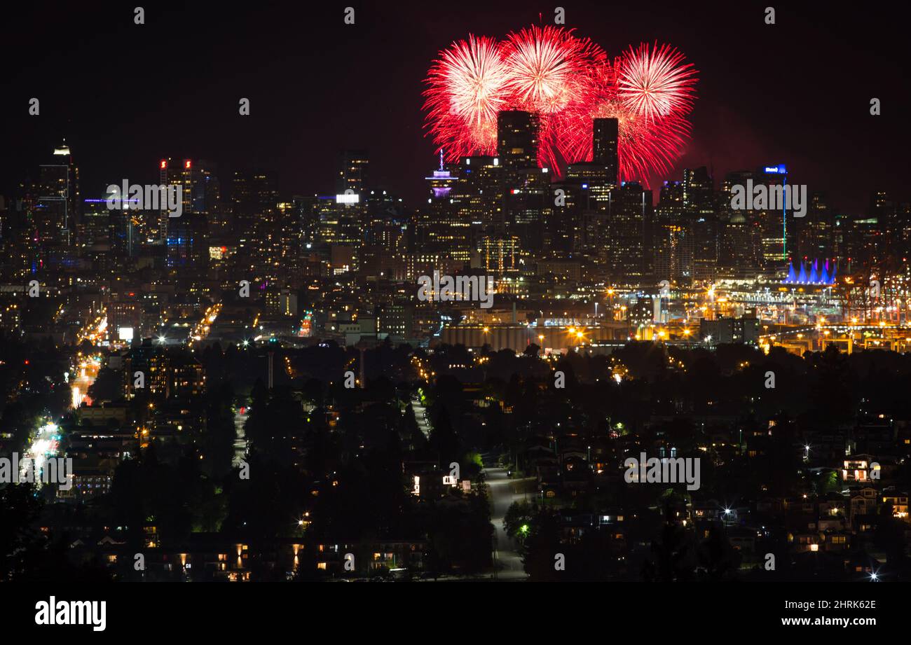 Seen from Burnaby Mountain approximately 16 kilometres away, fireworks explode behind the downtown Vancouver skyline as a pyrotechnic team from Croatia closes out the final night of the Honda Celebration of Light, in Vancouver, on Saturday August 3, 2019. Teams from India, Canada and Croatia competed over three nights shooting off shells from a barge on English Bay at the annual international fireworks festival that draws crowds of hundreds of thousands of people to watch each night. THE CANADIAN PRESS/Darryl Dyck Stock Photo