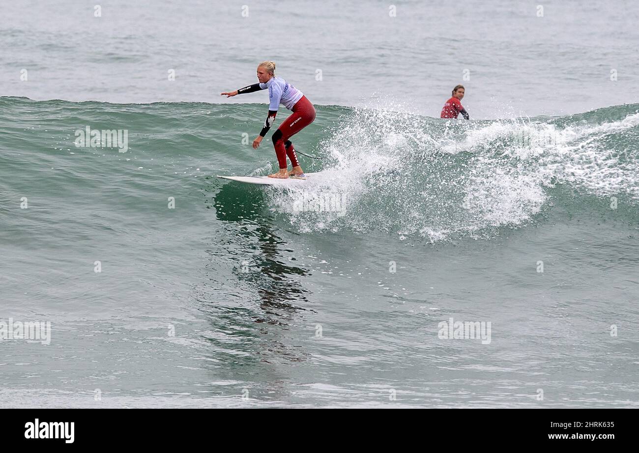 Canada's Mathea Olin competes in the women's longboard surfing event at