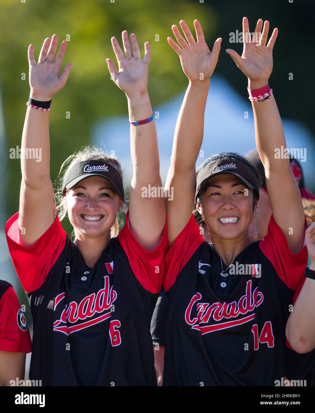 Canada's Holly Speers, left, and teammate Leung celebrate after