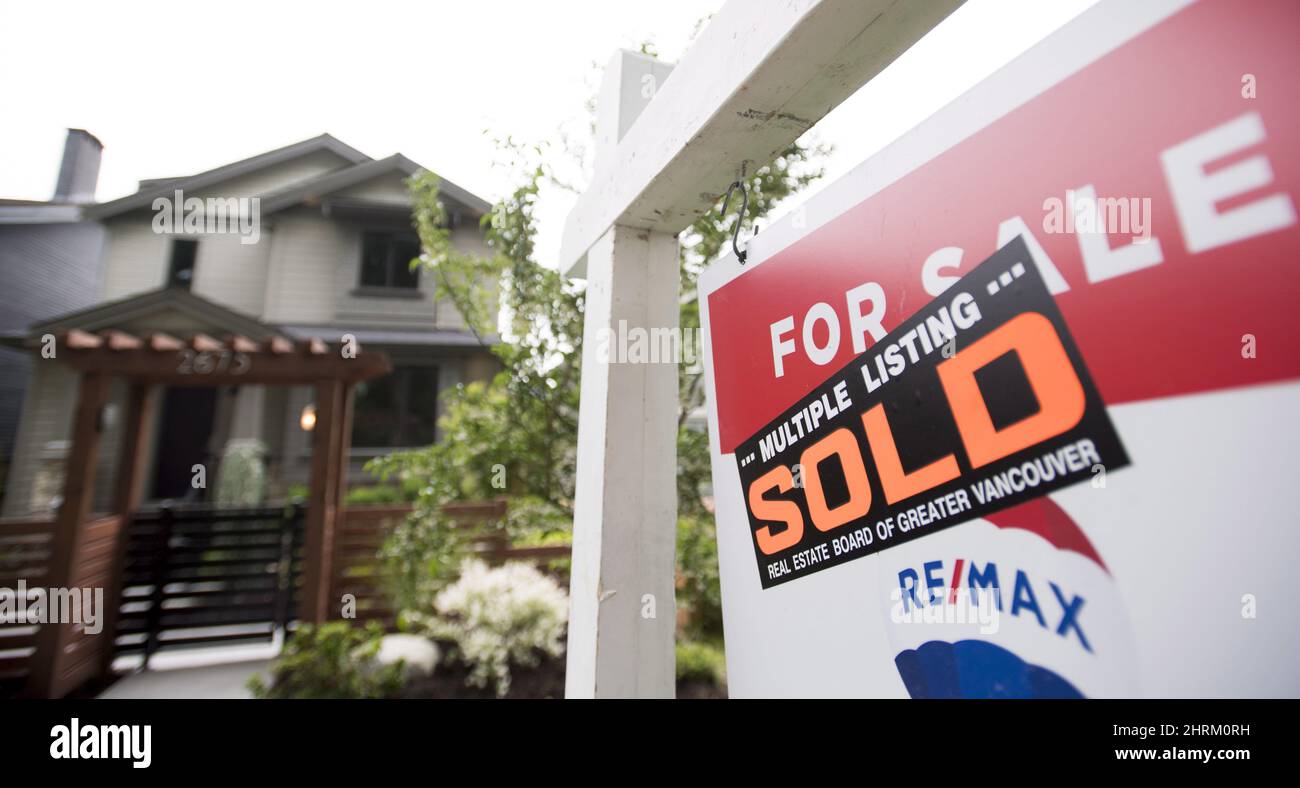 A real estate sign is pictured in Vancouver, B.C., Tuesday, June, 12, 2018. Housing sales in British Columbia are climbing faster than anticipated after a downturn, but a rebound won't be as inflamed as the sellers' market two years ago, says a report released Monday by Central 1 Credit Union. THE CANADIAN PRESS Jonathan Hayward Stock Photo