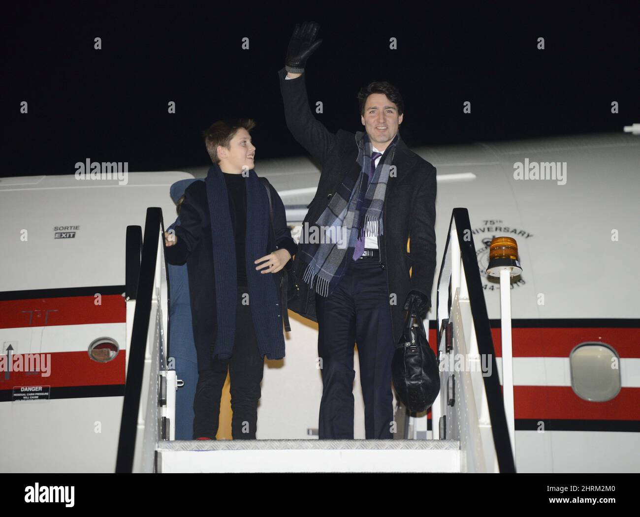 Prime Minister Justin Trudeau and son Xavier arrive in London on Monday