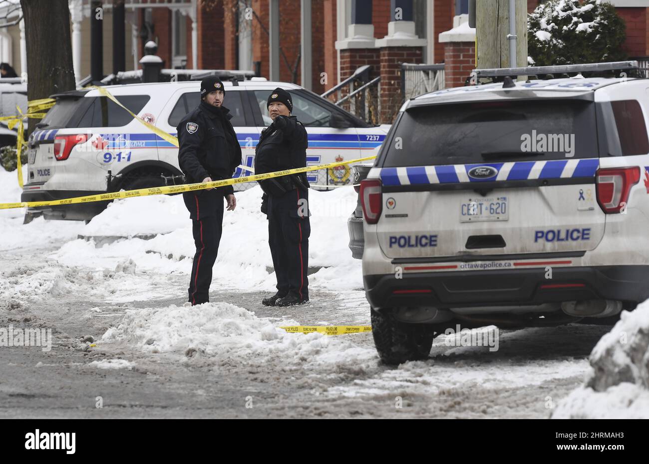 Police inspect the scene of a shooting in downtown Ottawa on Wednesday ...