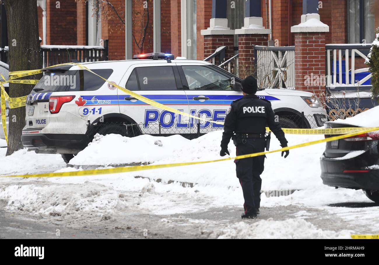 Police inspect the scene of a shooting in downtown Ottawa on Wednesday ...