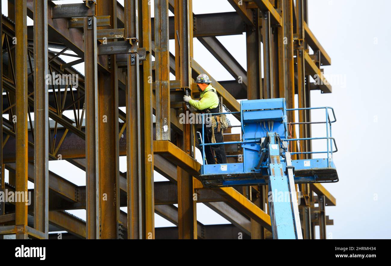 A steel worker builds a structure in Ottawa on Monday, March 5, 2018 ...