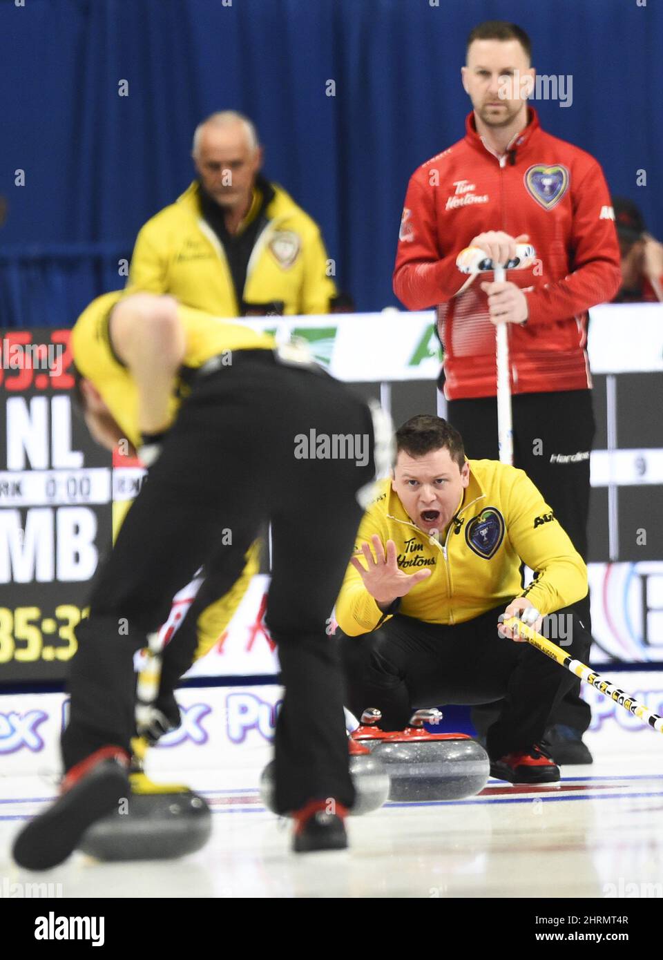 Team Manitoba skip Jason Gunnlaugson calls the sweep as Newfoundland