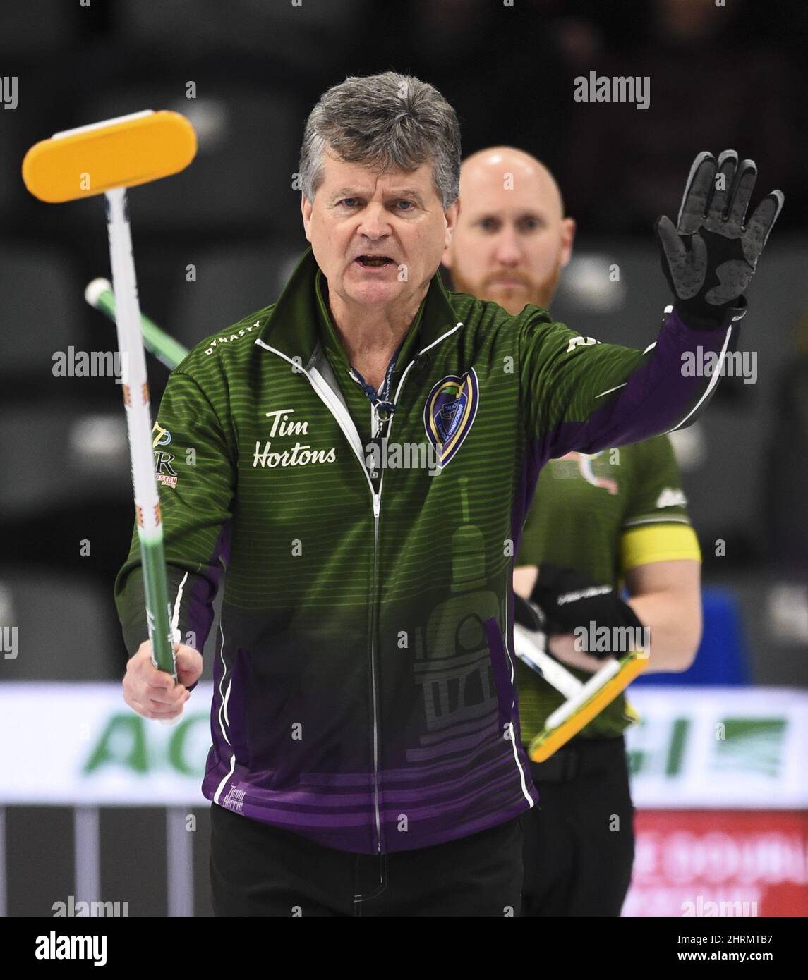 Team Prince Edward Island skip Bryan Cochrane calls the sweep as Team