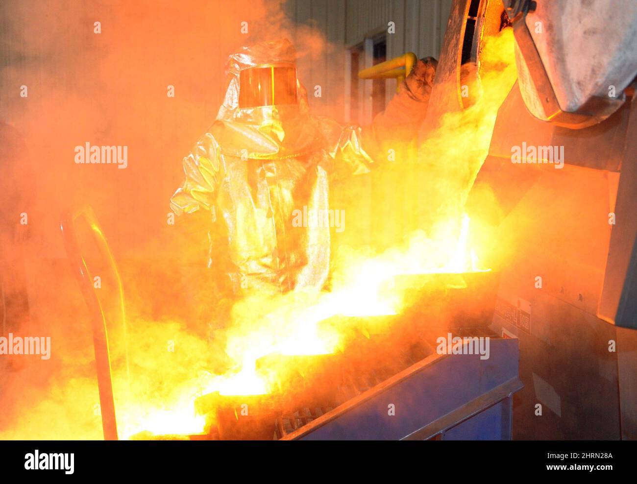 Gold is poured as at Agnico-Eagle's Meadowbank mine facility in Nunavut ...