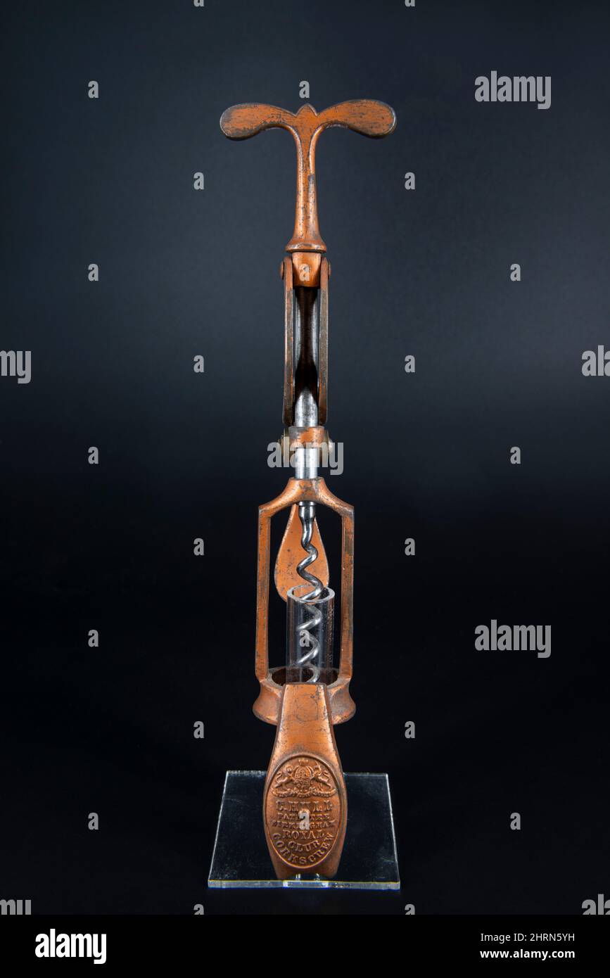 Vintage antique corkscrew on black background Stock Photo - Alamy