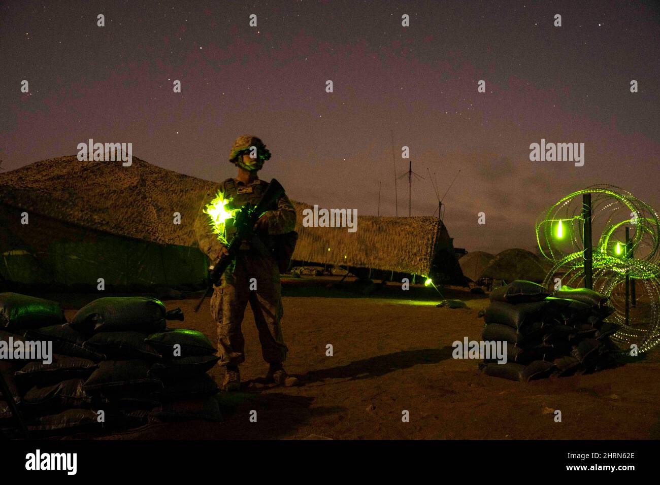 Djibouti. 8th Feb, 2022. U.S. Marine Corps Cpl. Adrian Nieves, a data systems administrator with Marine Air Control Group Detachment East Africa Air Combat Element, conducts night watch during a joint command and control exercise at Quaid Range, Djibouti, Feb. 8, 2022. The MACG Det supports Combined Joint Task Force Horn of Africa (CJTF-HOA) by providing rapid communication capability for ground and air assets. The multi-day exercise demonstrated the MACG's ability to rapidly conduct command and control operations in a forward deployed location. (Credit Image: © U.S. Air Force/ZUMA Pres Stock Photo