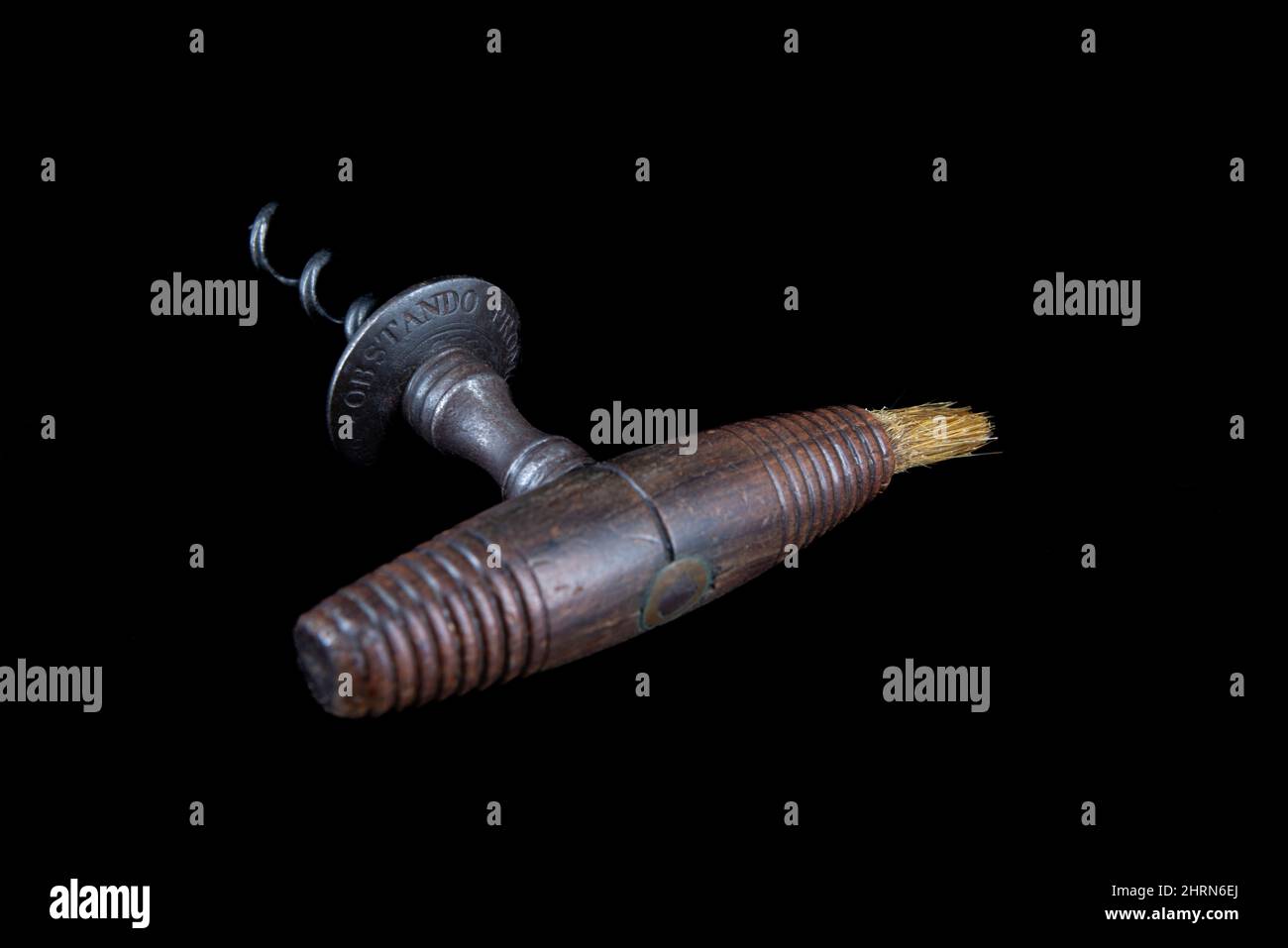 Vintage antique corkscrew on black background Stock Photo