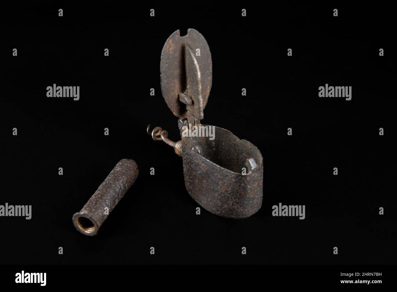 Vintage antique corkscrew on black background Stock Photo - Alamy