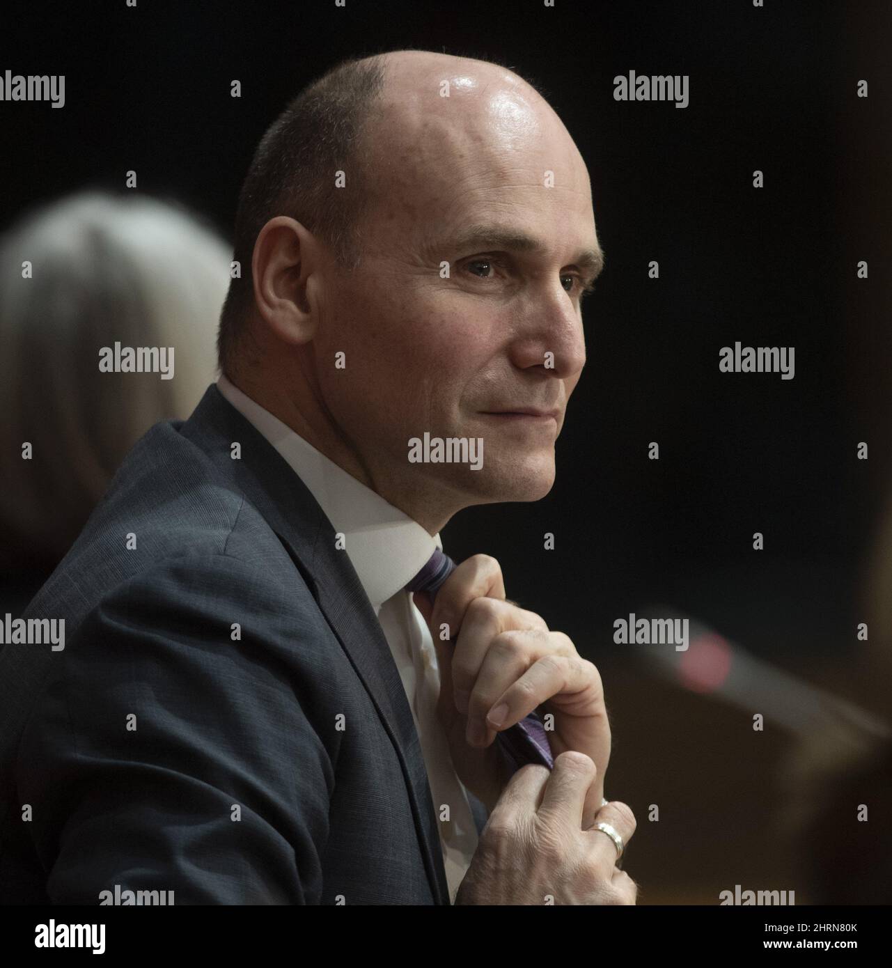 President of the Treasury Board JeanYves Duclos adjusts his tie during