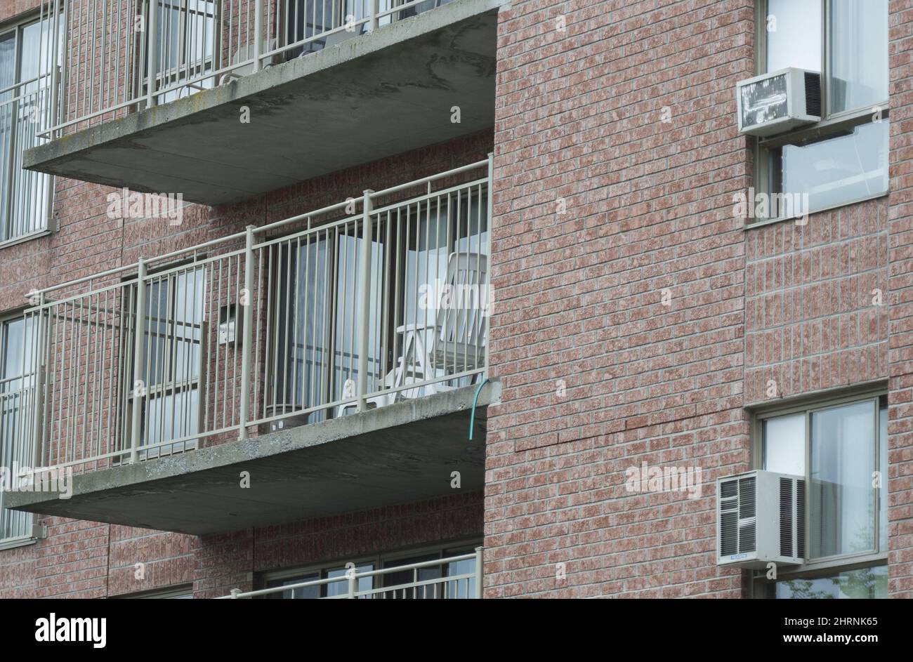 Air conditioning units are shown in the windows of a longterm care
