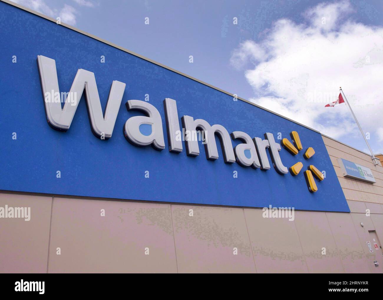 Signage at a Laval, Que., Walmart store is seen on May 3, 2016. Walmart