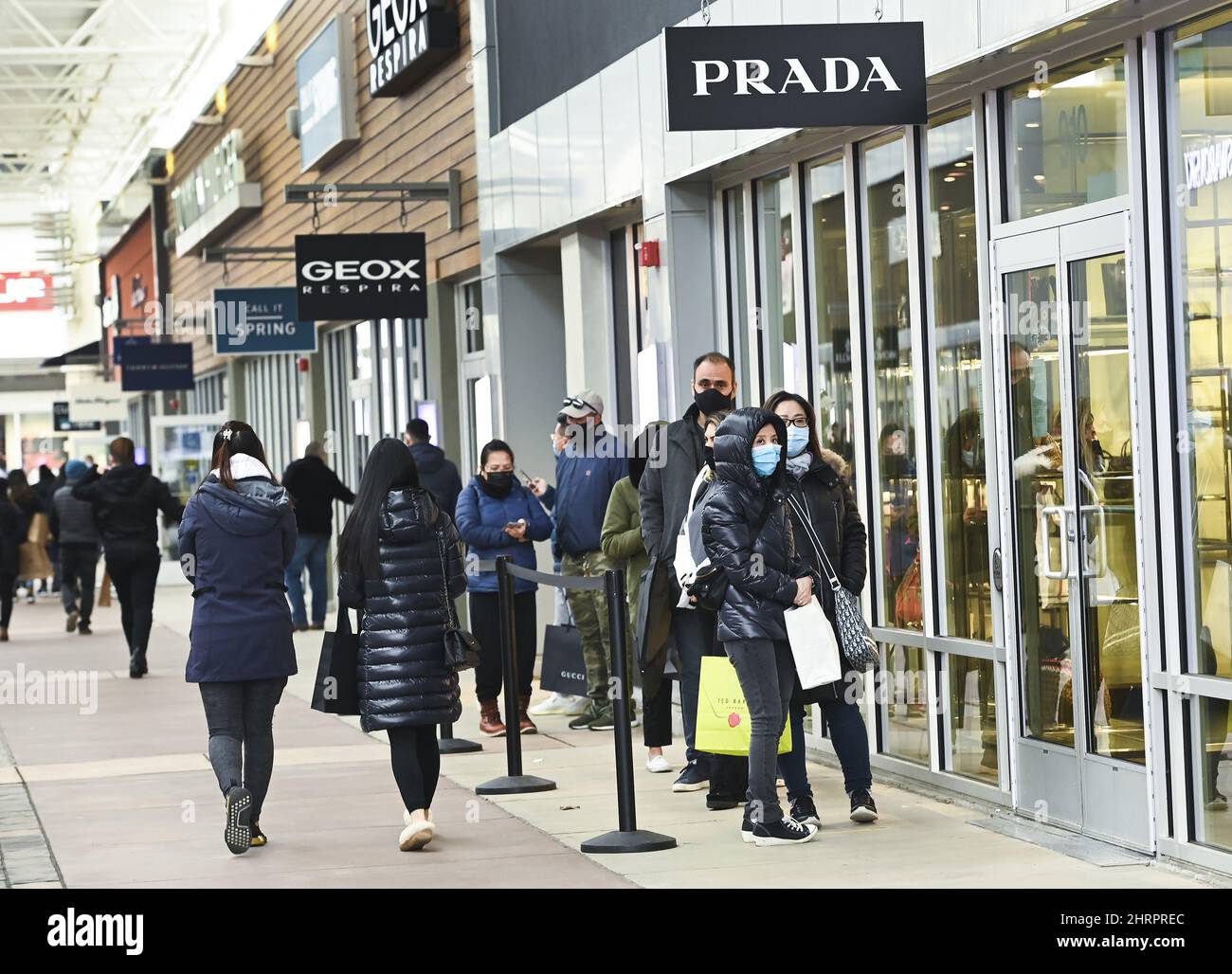 People line up at the Toronto Premium Outlets mall on Black Friday for  shopping sales during the COVID-19 pandemic in Milton, Ont., Friday, Nov.  27, 2020. Halton and York region is still