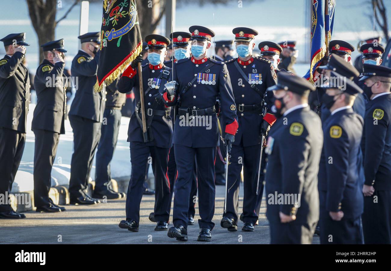 An Honour Guard Marches At The Funeral Service For Calgary Police ...