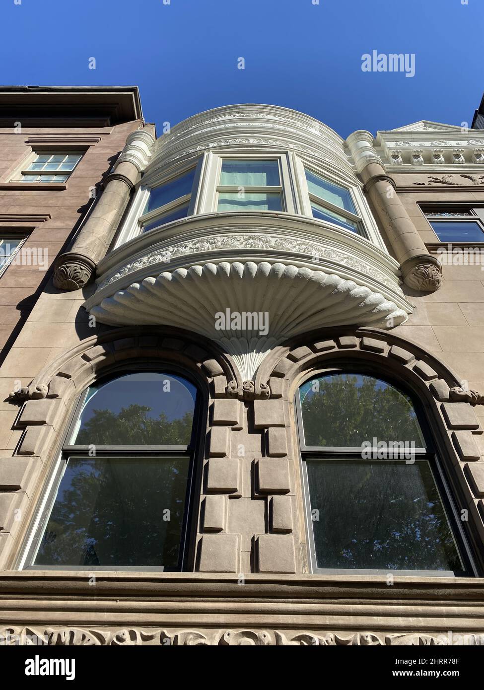 View of a modern building facade under the blue sky Stock Photo - Alamy