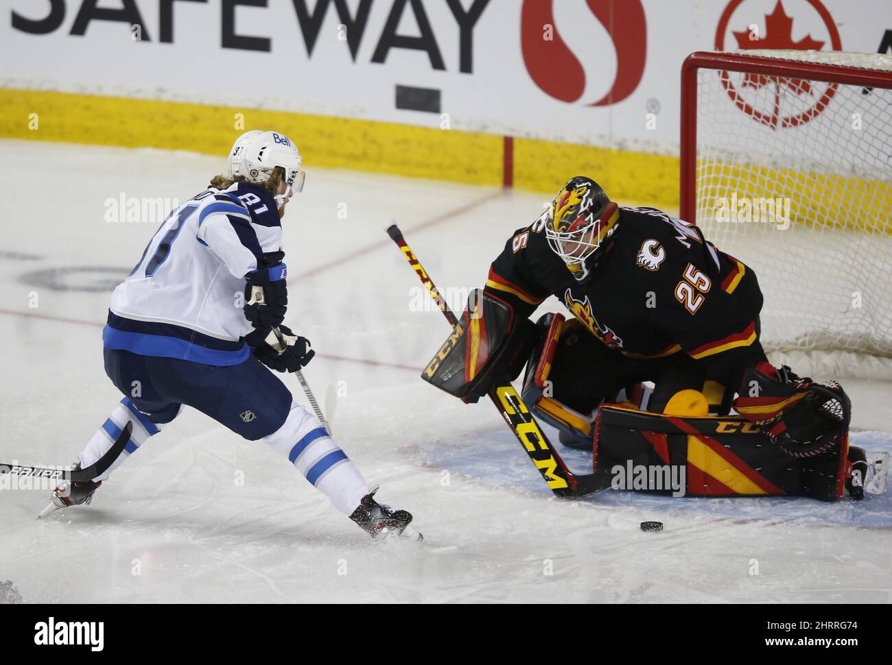 Calgary Flames goalie Jacob Markstrom makes a save against the Tampa Bay  Lightning during the second period of an NHL hockey game Thursday, March  10, 2022, in Calgary, Alberta. (Larry MacDougal/The Canadian