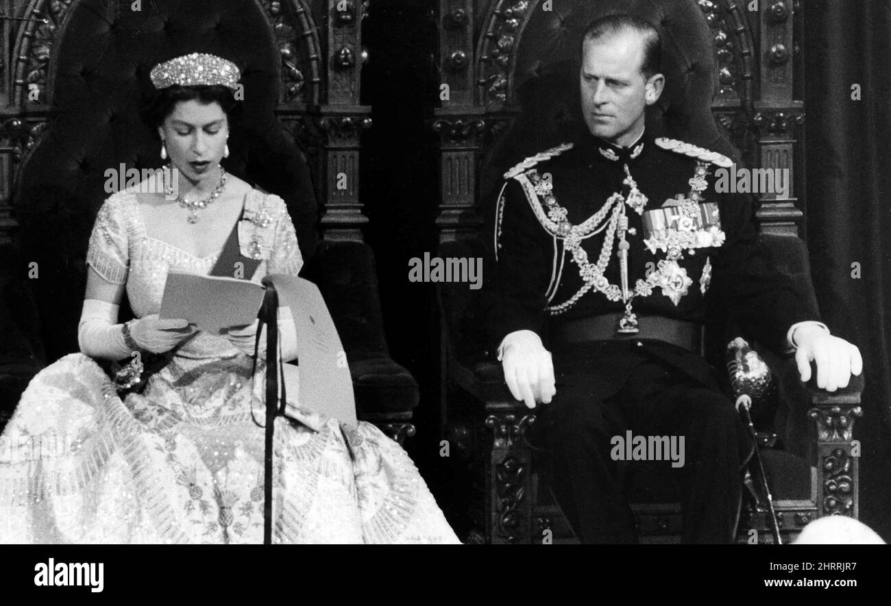 Prince Philip listens attentively as the Queen reads the Speech from