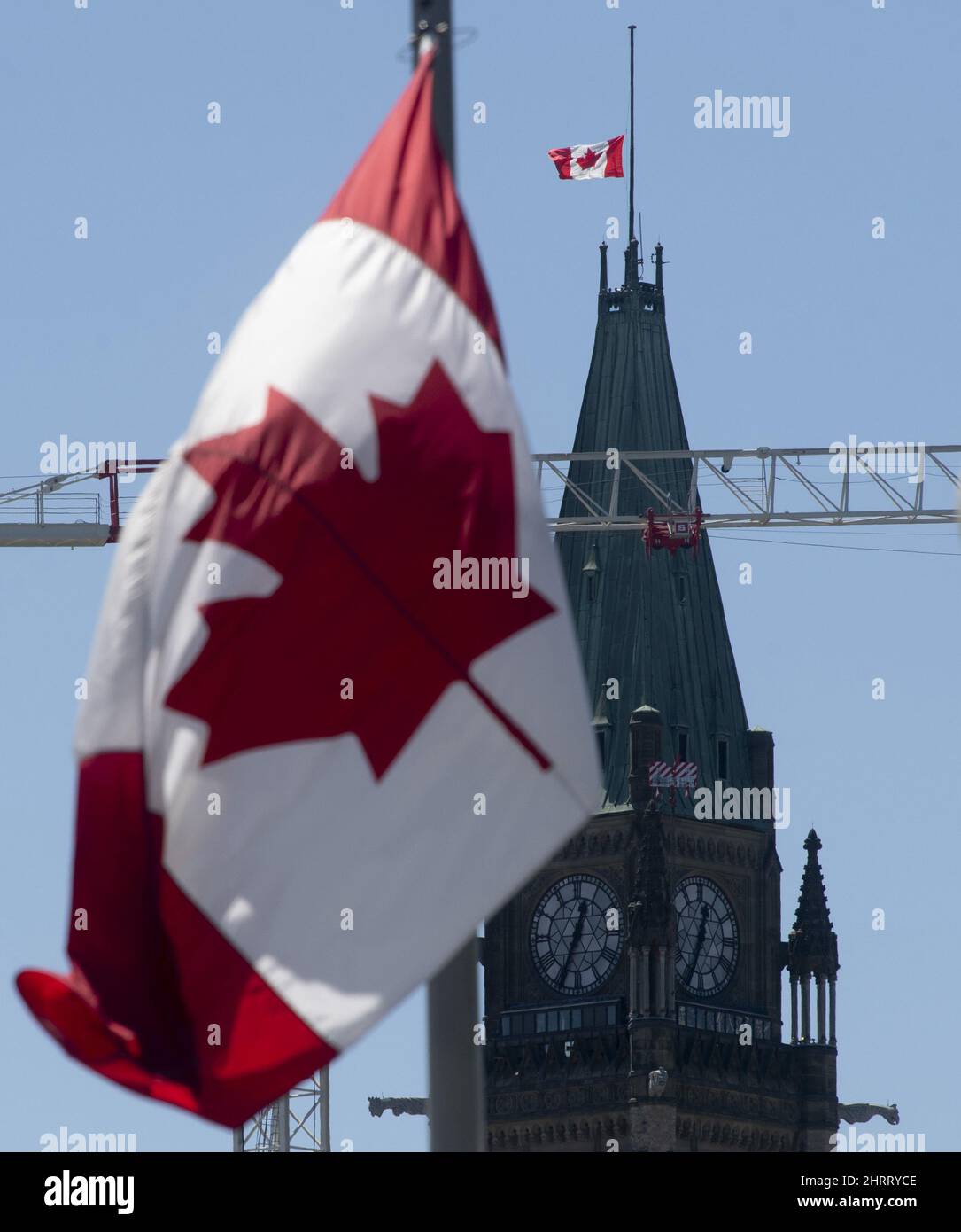 Canadian flags fly at half mast on the Peace Tower and around the city, Monday, May 31, 2021 in