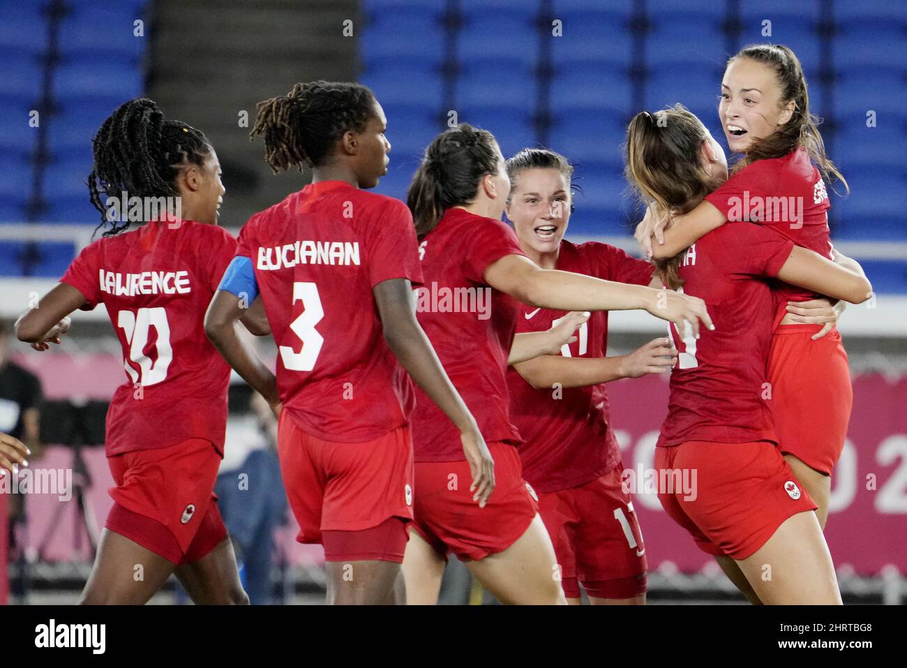 Canada celebrates after defeating Sweden in the penalty shootout in