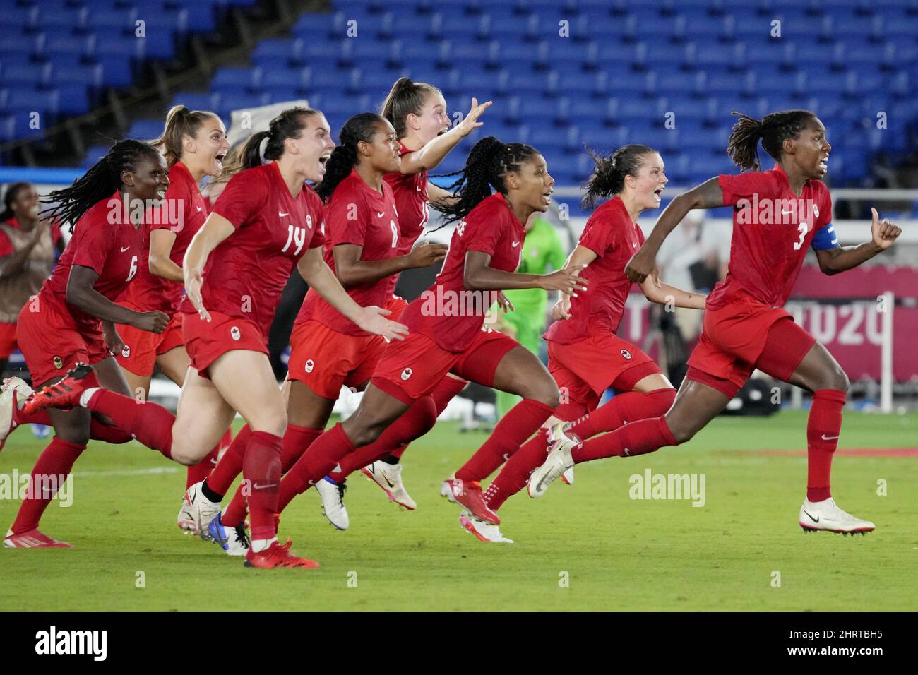 Canada celebrates after defeating Sweden in the penalty shootout in
