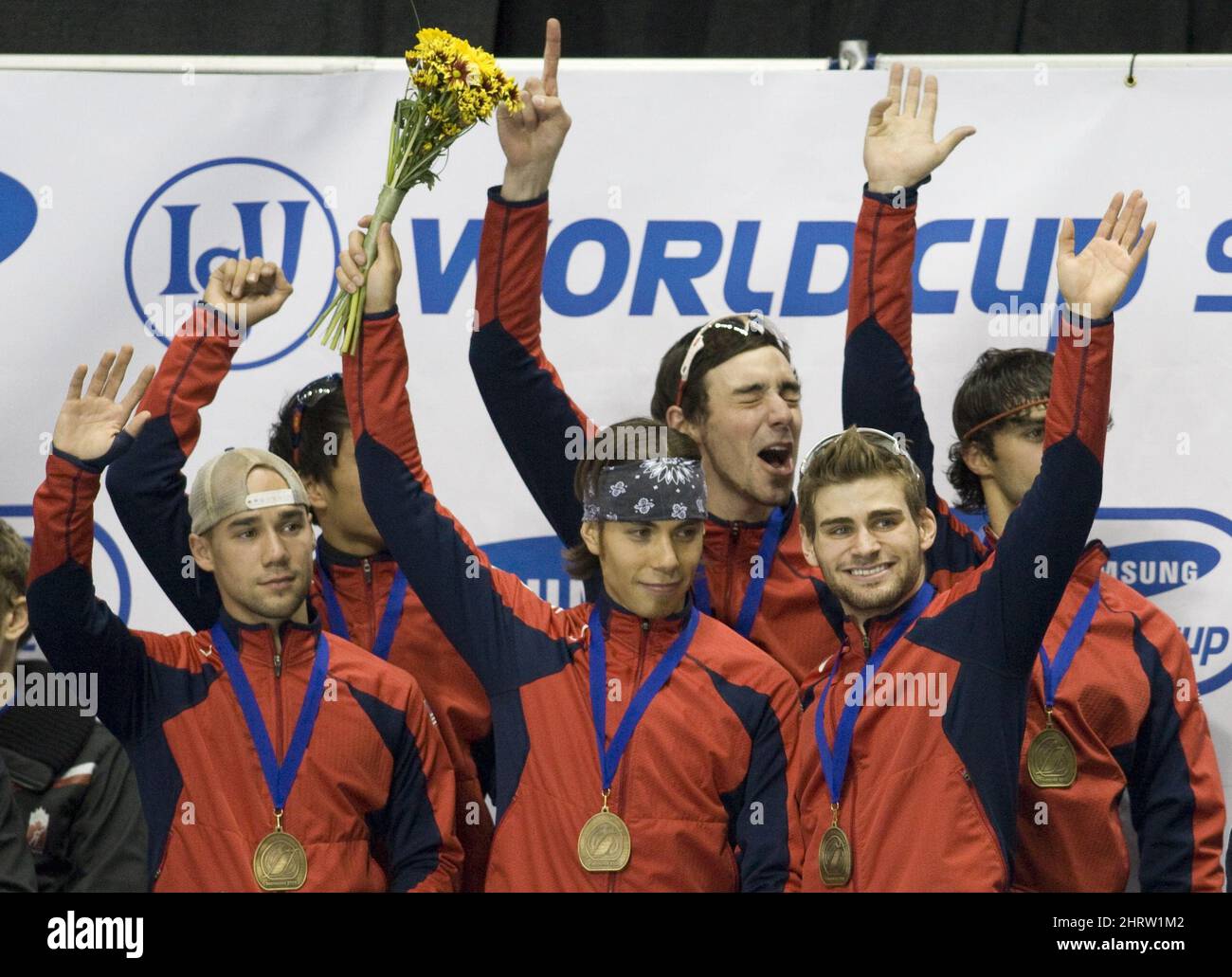 Members of the U.S. men's team celebrate their win in the 5,000 relay at the World Cup short track speed skating championships in Vancouver, British Columbia, Sunday, Oct. 26, 2008. (AP Photo/The Canadian Press, Jonathan Hayward) Stock Photo