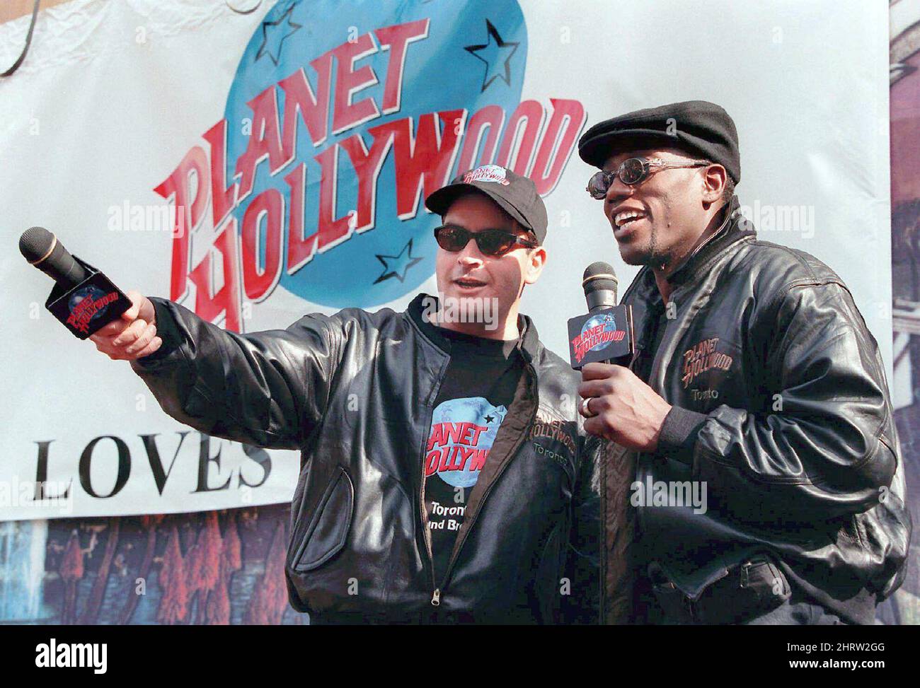 Actors Charlie Sheen and Wesley Snipes address a crowd of fans at the ...