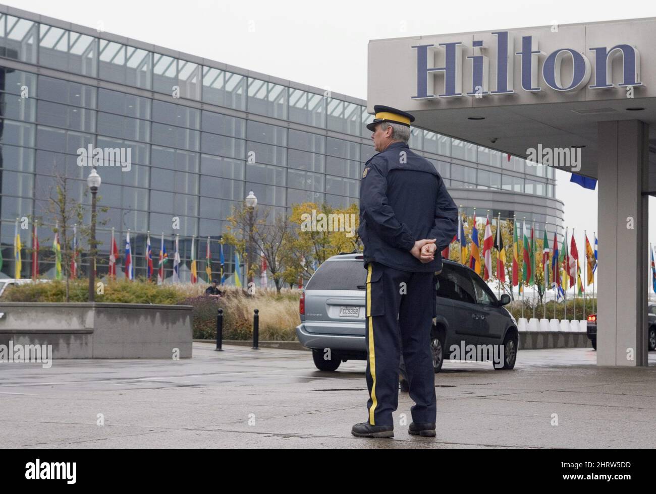 Rcmp Security An RCMP officer stands outside the convention centre and the hotel at ...