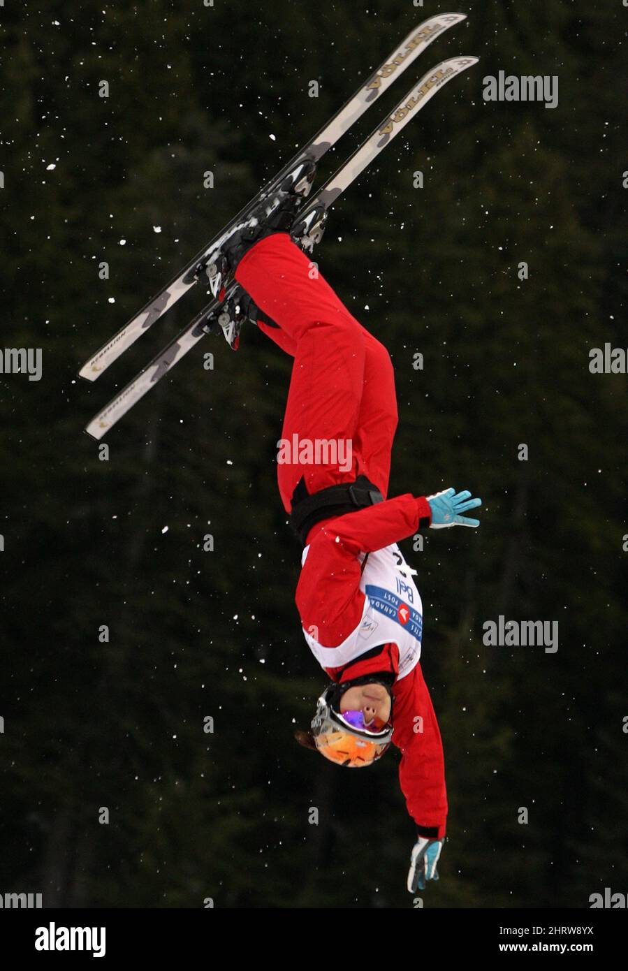 Nina Li, of China, flies through the air to the second best score of the day during women's aerials qualifying at the Freestyle Grand Prix at Cypress Mountain in West Vancouver, British Columbia, on Thursday, Feb. 5, 2009. (AP Photo/The Canadian Press,/Darryl Dyck) Stock Photo