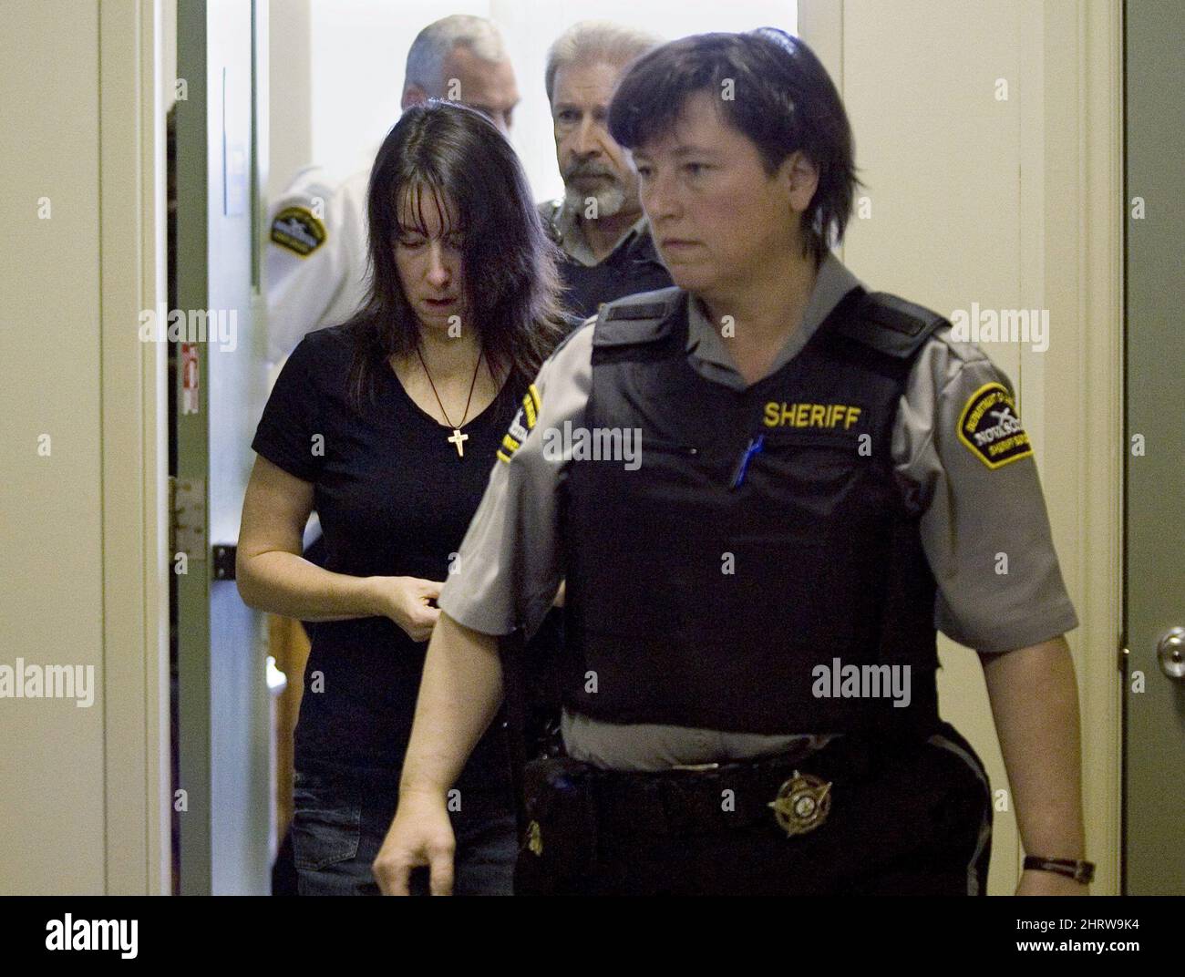 Penny Boudreau, left, heads from Supreme Court Supreme in Bridgewater, N.S. on Thursday, Dec. 4, 2008. Boudreau is charged with the first-degree murder of her 12-year-old daughter Karissa Boudreau. Stock Photo