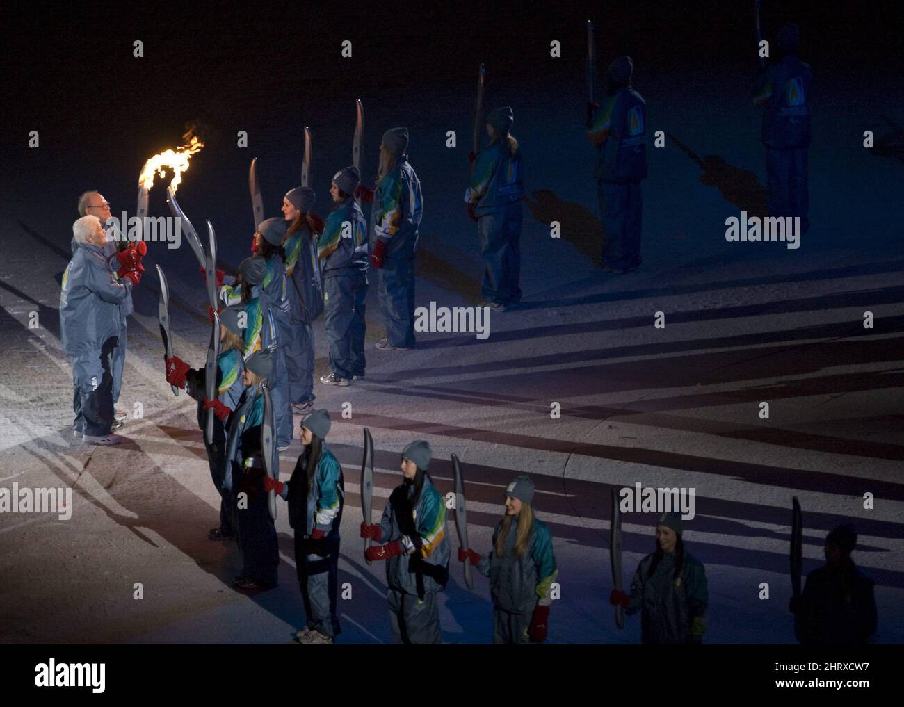 Betty and Rolly Fox carry the Paralympic flame into the stadium during the opening ceremonies of the Winter Paralympic Games in Vancouver, Friday, March 12, 2010. THE CANADIAN PRESS/Jonathan Hayward Stock Photo