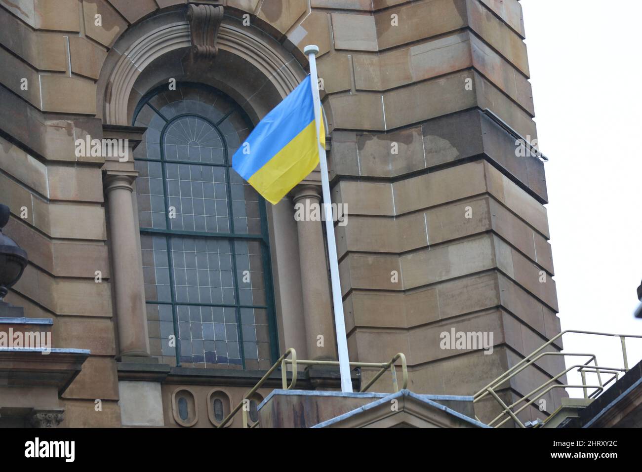 Sydney, Australia. 26th February 2022. The Ukrainian flag is being flown on Sydney Town Hall in support of Ukraine after their invasion by Russia. Credit: Richard Milnes/Alamy Live News Stock Photo
