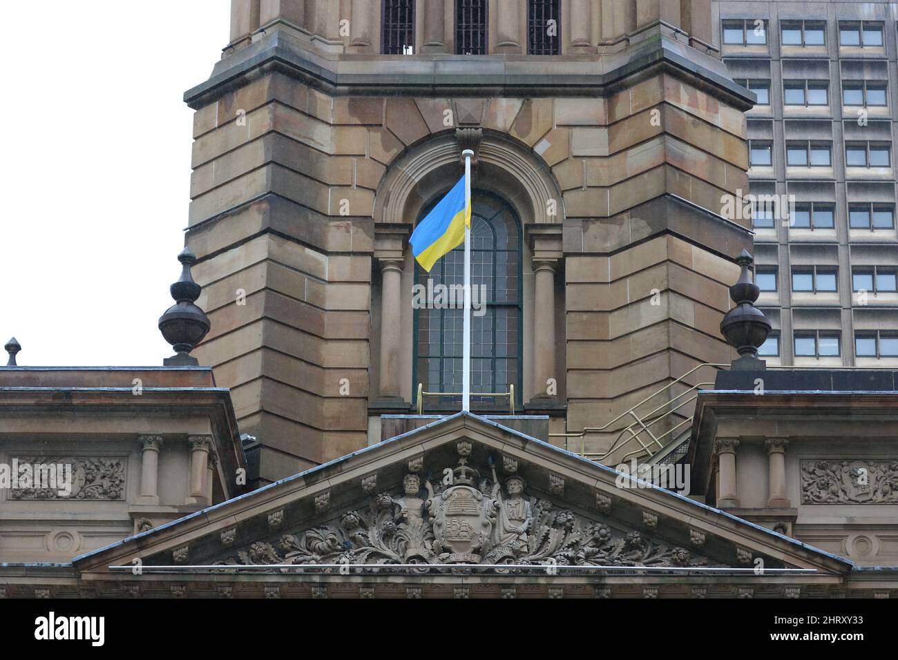 Sydney, Australia. 26th February 2022. The Ukrainian flag is being flown on Sydney Town Hall in support of Ukraine after their invasion by Russia. Credit: Richard Milnes/Alamy Live News Stock Photo