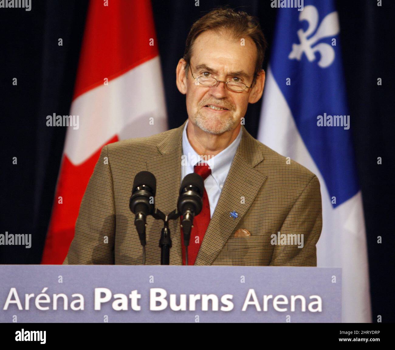 FILE - This March 26, 2010, file photo shows former NHL head coach Pat Burns during a news conference where a new arena was named after him, in Stanstead, Quebec. Pat Burns wants the world to know that he's still very much alive, despite reports and thousands of tweets suggesting otherwise. The former NHL coach, who is battling cancer, called TSN hockey columnist Bob McKenzie on Friday, Sept. 17, 2010, after seeing reports of his death at age 58. (AP Photo/The Canadian Press, Ryan Remiorz, File) Stock Photo