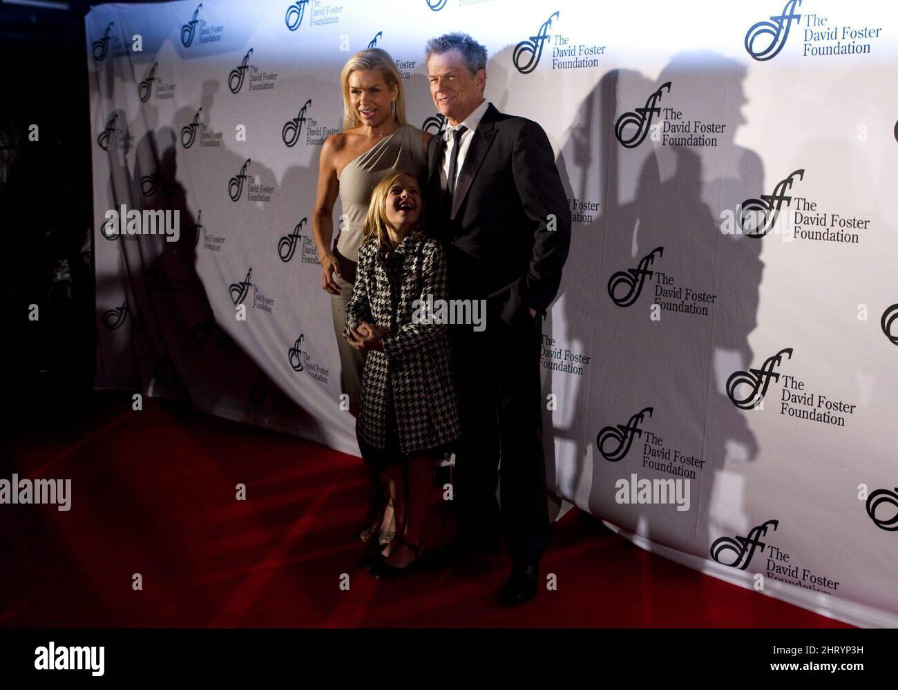 David Foster (right) poses for photographers with his partner Yolanda