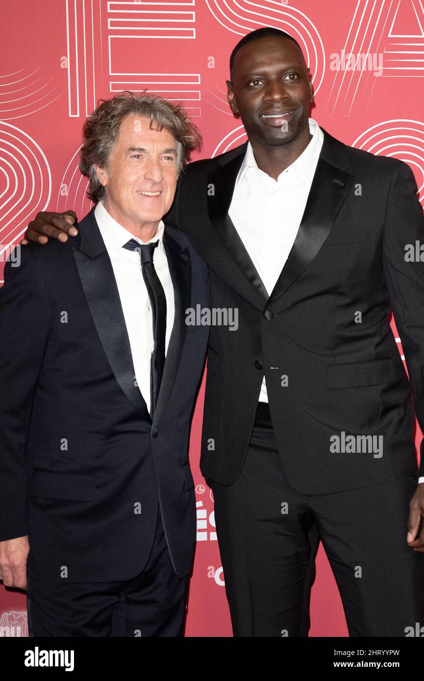 Paris, France. 26th Feb, 2022. Francois Cluzet and Omar Sy pose during the 47th edition of the Cesar Film Awards ceremony at the Olympia in Paris, France on March 25, 2022. Photo by David Niviere/ABACAPRESS.COM Credit: Abaca Press/Alamy Live News Stock Photo